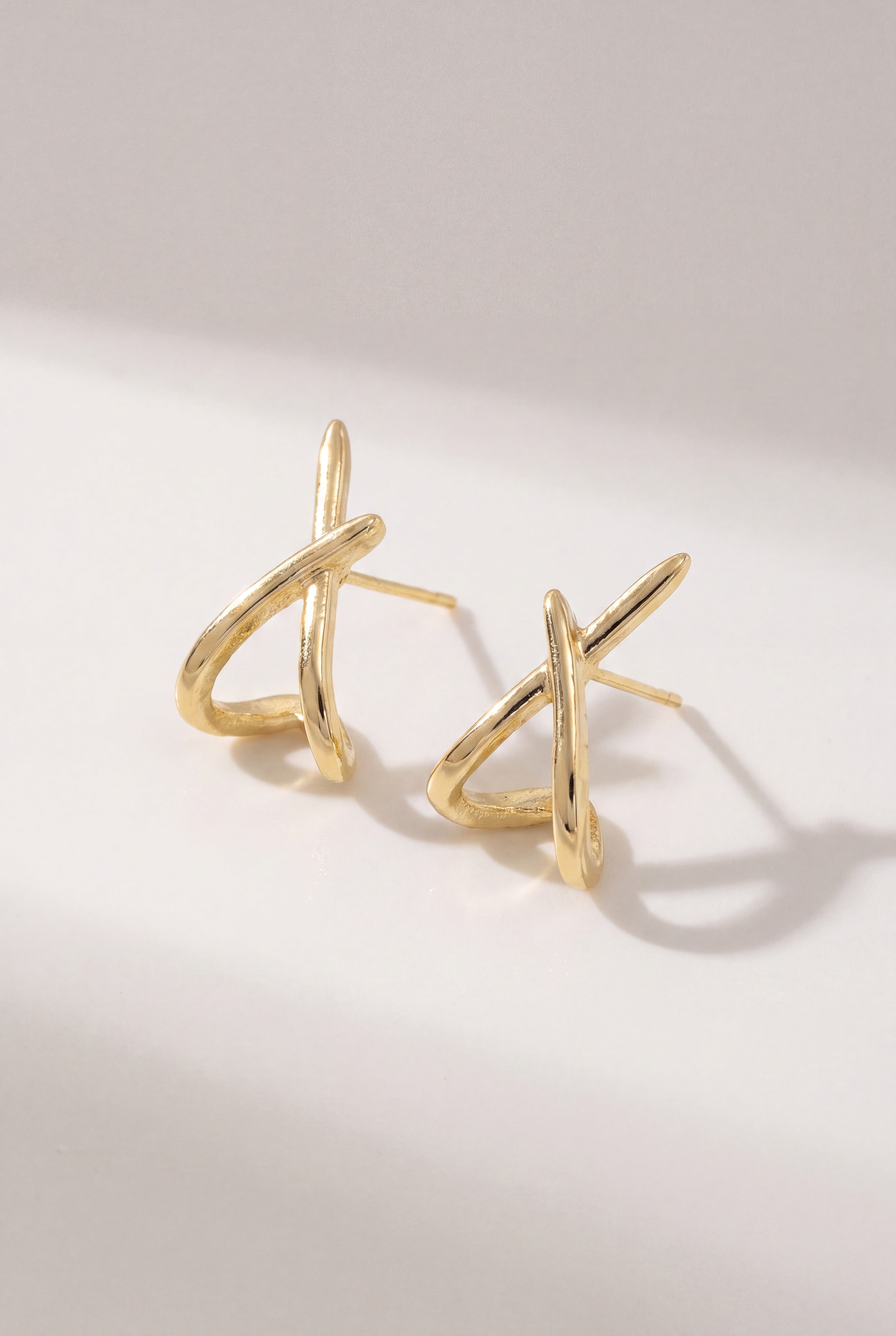 Gold Crossover Hoop Earrings
